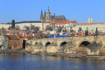 Fototapeta na wymiar Prague gothic Castle and Charles Bridge with its Statues