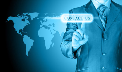 businessman hand pushing contact us button