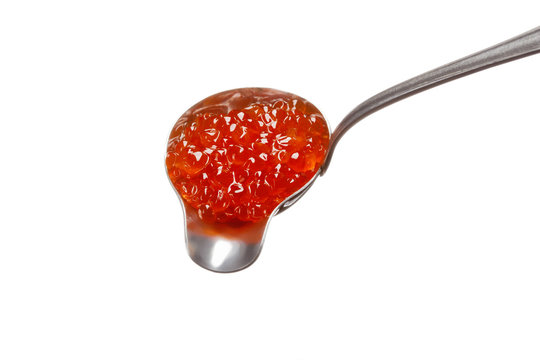 big spoon with caviar on the white background