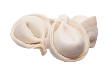 bunch of fresh frozen dumplings ready for cooking, isolated on w