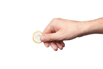 Condom in hand, isolated on white background