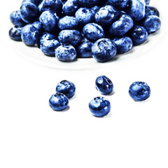 Fresh Blueberries on white plate isolated on white background cl