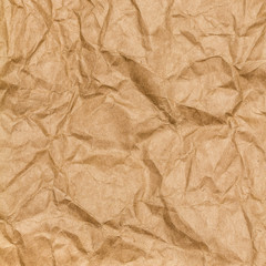 Crumpled paper texture background. Craft paper sheet, brown colo