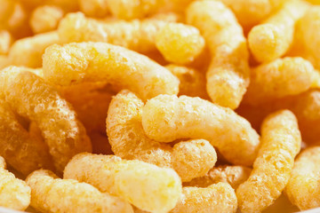 Air corn sticks closeup background © romankorytov