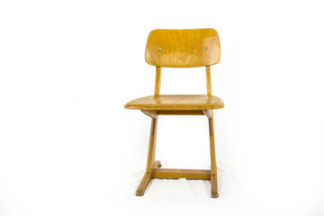 old used wooden school chair for the young pupils