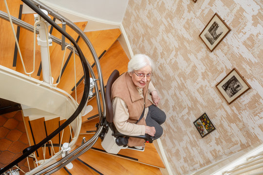elderly woman using the stairlift