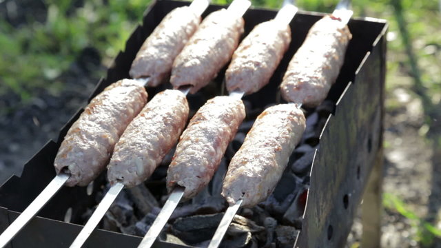 cooking lamb kebab, healthy outdoor picnic