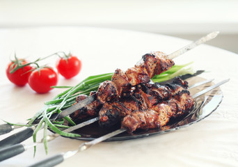 grilled pork meat on the plate, pork barbecue