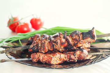 grilled pork meat on the plate, pork barbecue