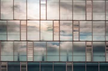 Window with cloud reflection
