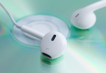 White earphone on music dvd