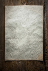 paper on wooden background
