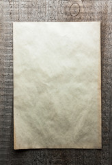 Fototapeta premium paper on wooden background