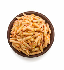 pasta Penne in plate on white background