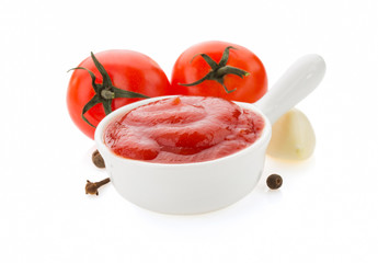 tomato sauce in bowl on white