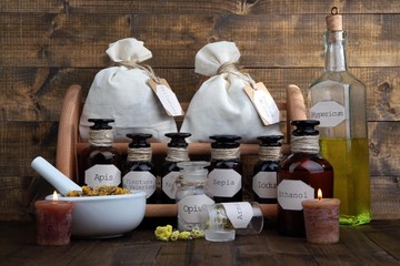 Historic old pharmacy bottles with label   on wooden background