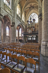 Fototapeta na wymiar Organ instrument of gothic church Notre Dame au Sablon