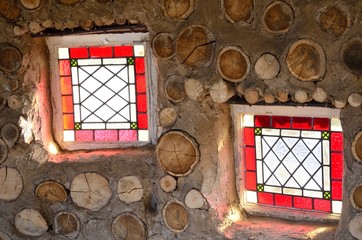 Two small red stained glass windows