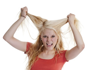 junge Frau rauft sich Haare