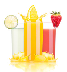 tasty summer fruit drinks in glass with splash