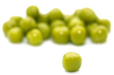 green peas on a white background. macro