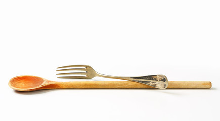 Wooden spoon and metal fork