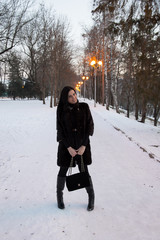 Young beautiful girl on a walk in the country