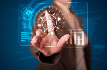 Woman pressing high tech type of modern buttons