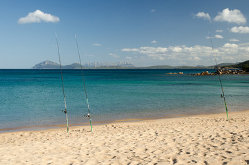 fishing at Cala Liscia Ruja beach.