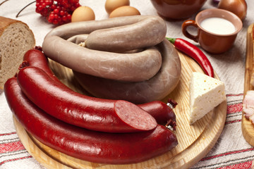 Home-made sausages on the cutting board.
