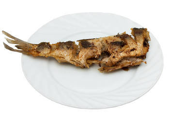 fried fish on a plate on white background