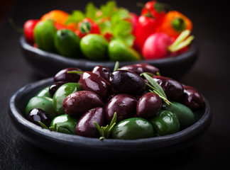 Variation of olives with raw snack vegetable