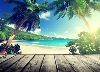 seychelles beach and wooden pier