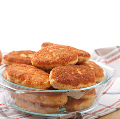 Chicken cutlets in a glass bowl