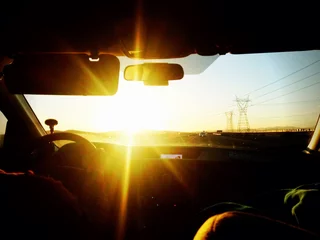 Foto op Plexiglas beautiful light during driving back home © nengmax