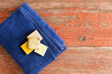 Organic soaps on a soft blue towel