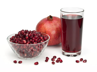 Juice and pomegranate fruits