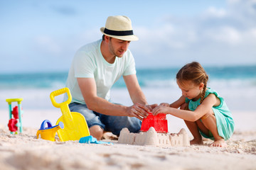 Father and daughter at beach