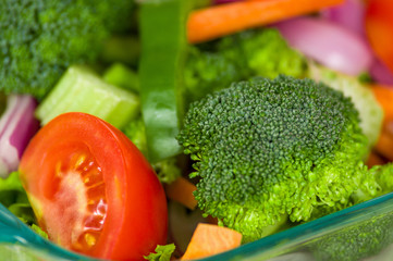 Fresh broccoli salad with lettuce, broccoli and tomato