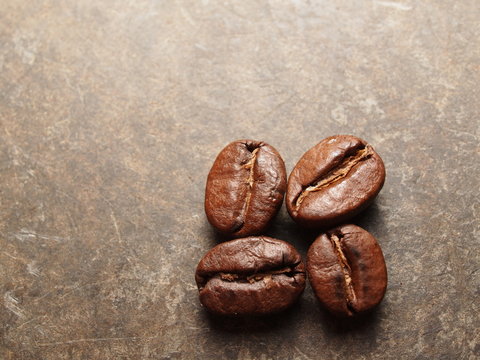 Roasted Coffee beans on texture floor