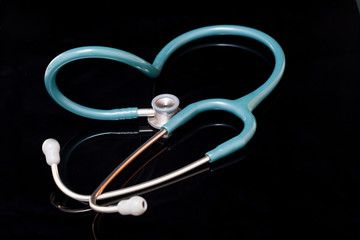 Stethoscope isolated on black background.