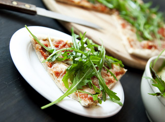 Slice of Pizza Margherita with Arugula