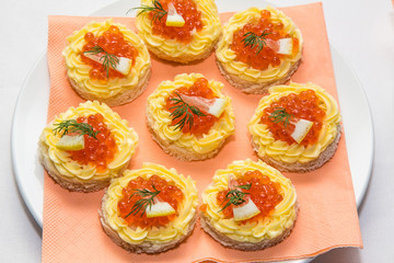 Red caviar on bread