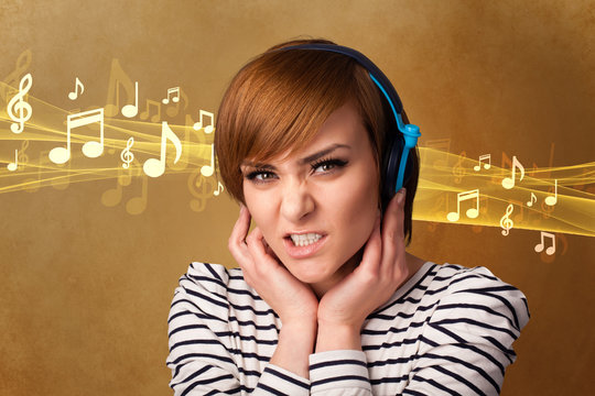 Young woman with headphones listening to music