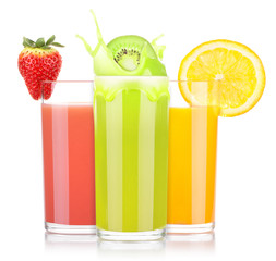 tasty summer fruit drinks in glass with splash