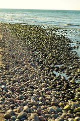 Obraz premium Rocky Beach Flooded With Water
