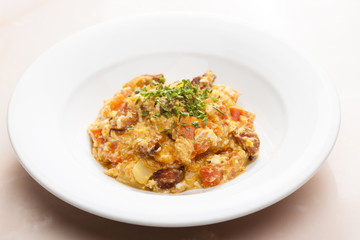 meal called leco (mixture of vegetables and eggs with sausage)