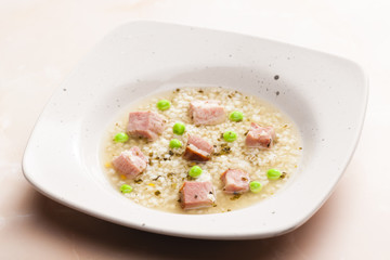 smoked meat bouillon with pearl barley and peas