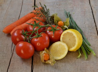 Vegetables and fruit on a wooden table