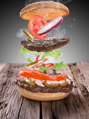 delicious hamburger on wood